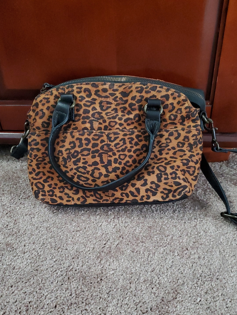 BRAND NEW!  NEVER USED.  Leopard Print Satchel in Brown with Black Trim
